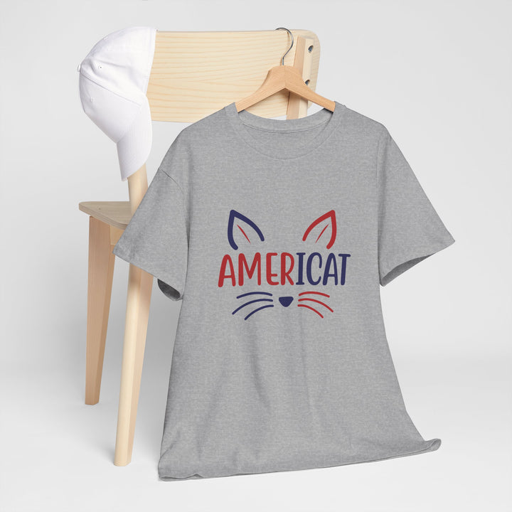 Gray t-shirt with 'AMERICAT' design on a wooden chair against a white background