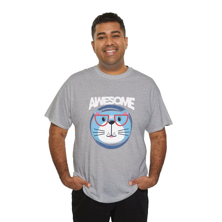 A man wearing a heather gray t-shirt with a graphic of a blue cat wearing red glasses and the word 'AWESOME' printed above it, set against a plain white background.