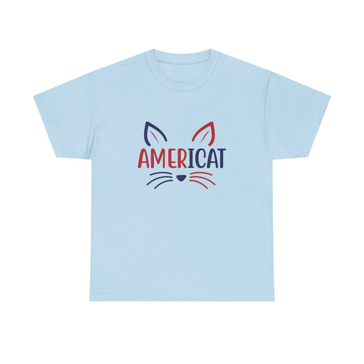 A light blue short-sleeve crewneck t-shirt featuring a graphic of a cat face with the word 'AMERICAT' across the nose and mouth, in navy blue and red.