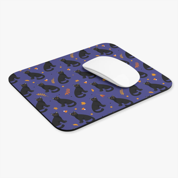 Mouse pad with black cat pattern on a purple background
