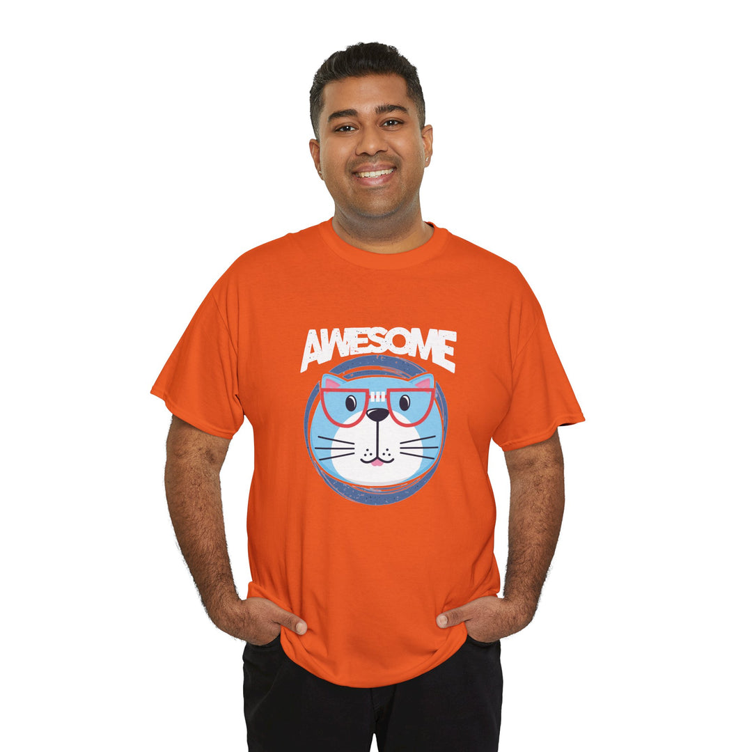 A man wearing a bright orange graphic t-shirt with a cartoon cat wearing pink glasses and the word 'AWESOME' printed above it, set against a plain white background.