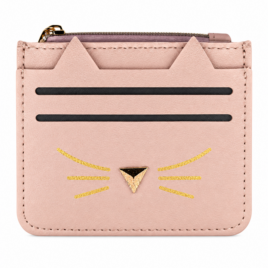 A light pink faux-leather card holder wallet designed like a cat face, featuring pointed ears, black horizontal card slots, and gold glitter whiskers and nose detail, shown on a plain white background.
