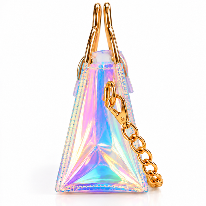A small triangular iridescent holographic handbag with gold-tone metal handles and a matching chain strap, shown on a clean white background.