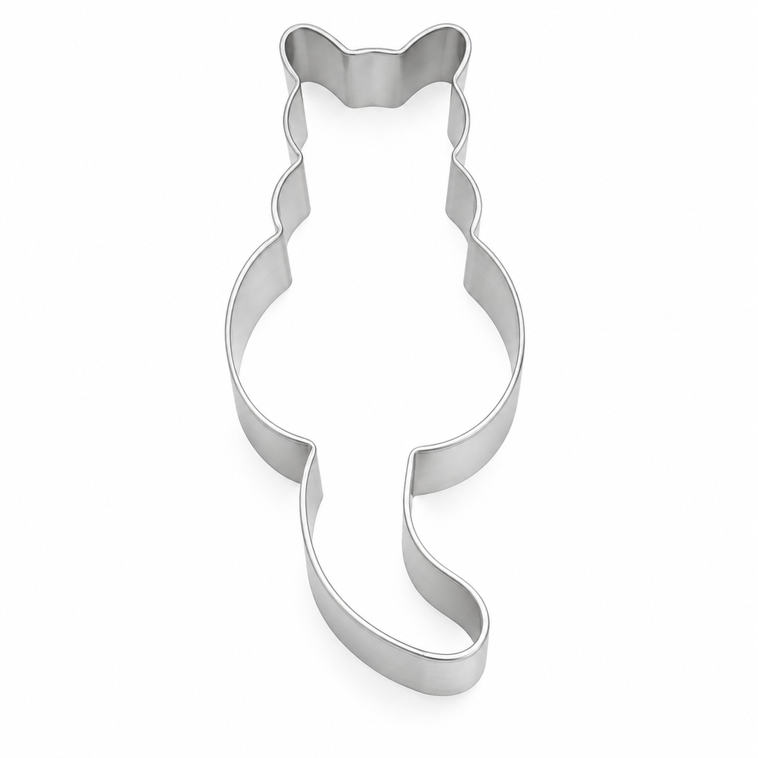 A silver metal cat-shaped cookie cutter on a plain white background.