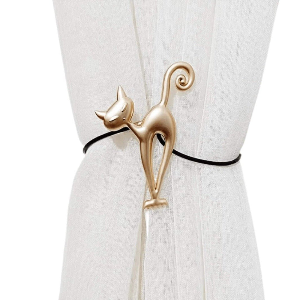 Gold metal cat curtain hook with whimsical cat silhouette